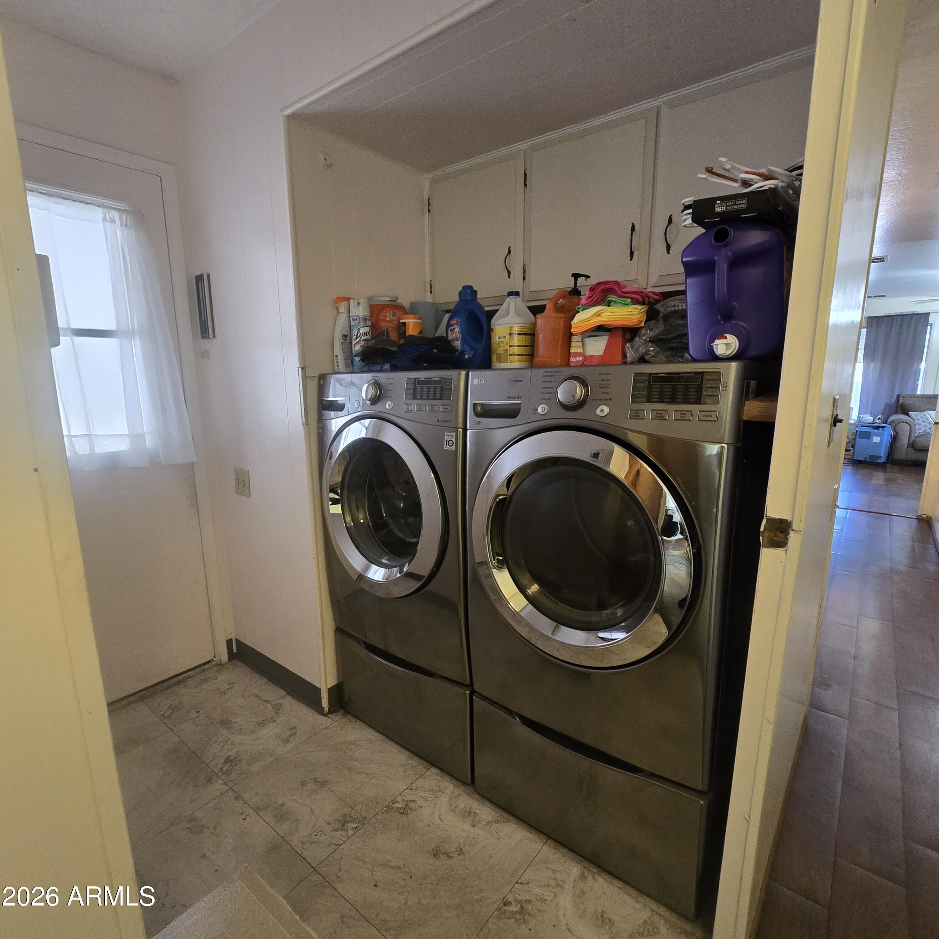 4800 West Ocotillo Road, Unit 154 Glendale, AZ 85301 - Photo 26 of 41 a utility room with dryer and washer