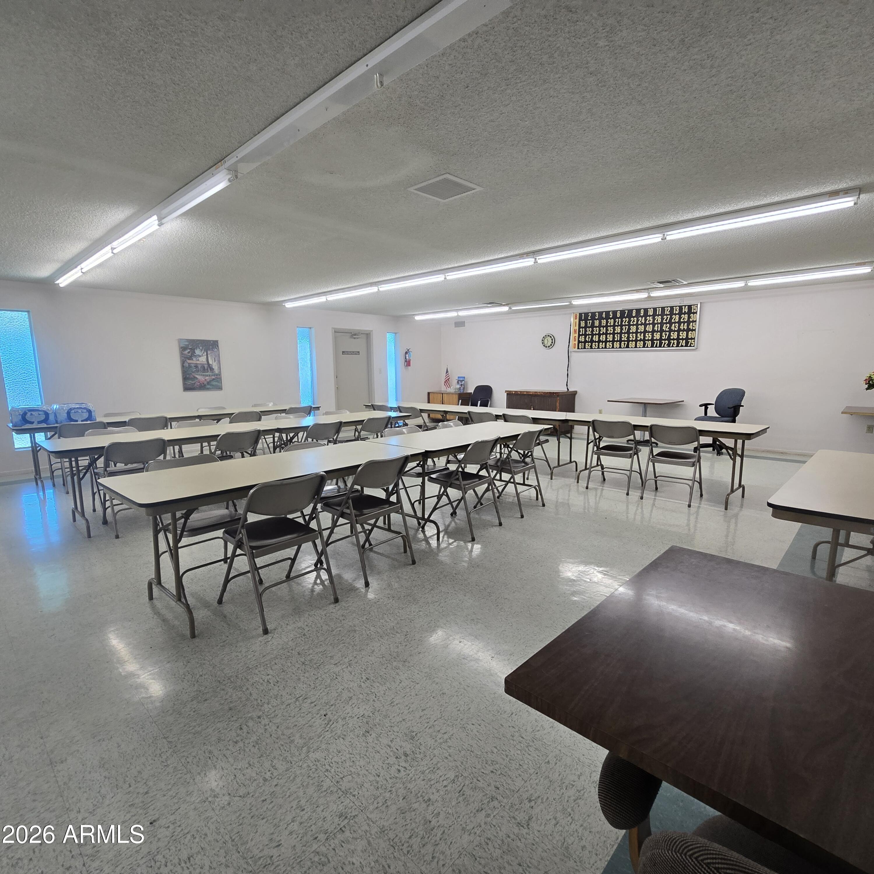 4800 West Ocotillo Road, Unit 154 Glendale, AZ 85301 - Photo 36 of 41 a living room with lots of furniture and a table