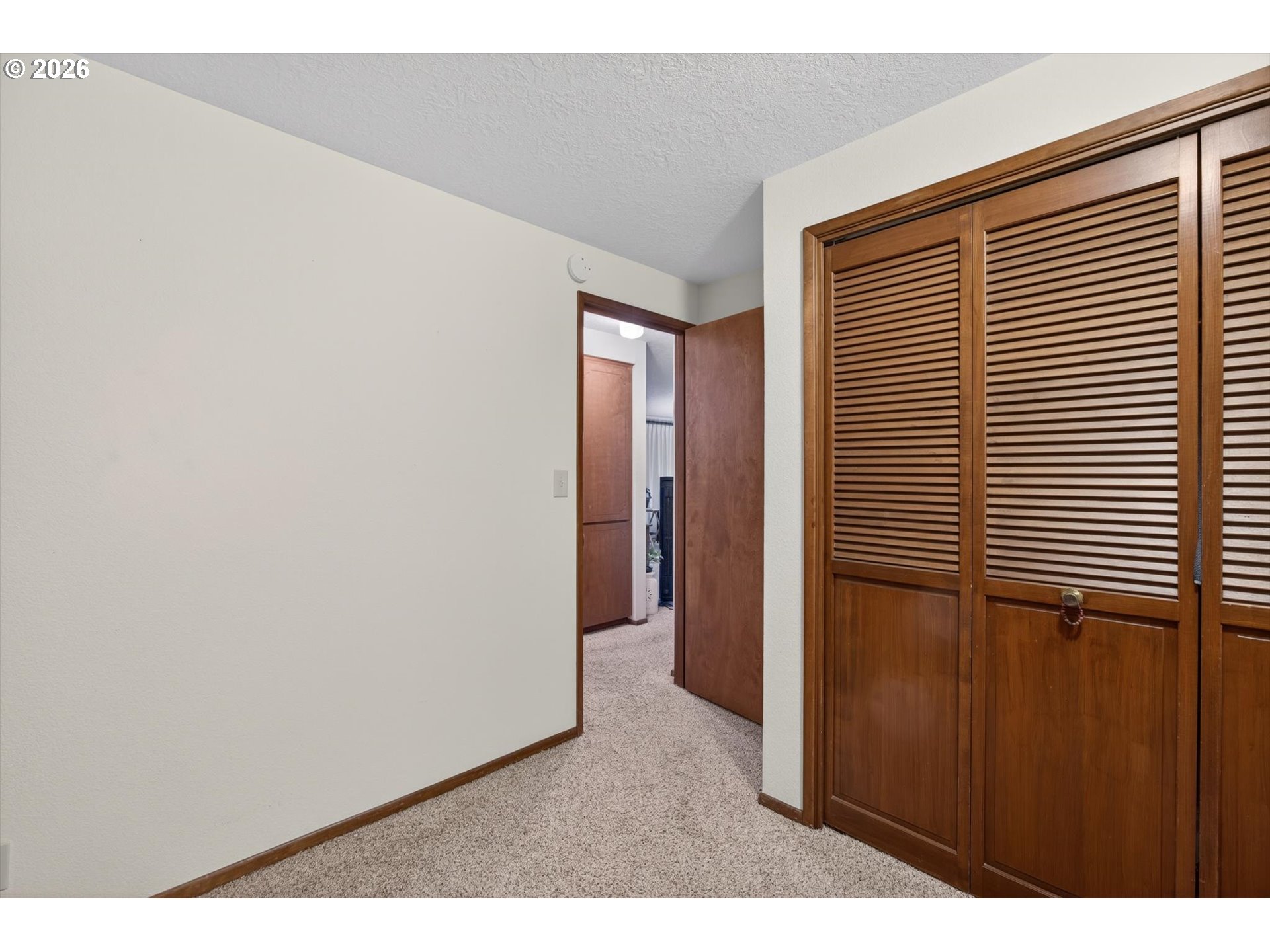 8050 Southwest 103rd Avenue Beaverton, OR 97008 - Photo 36 of 48 a view of hallway with a large window