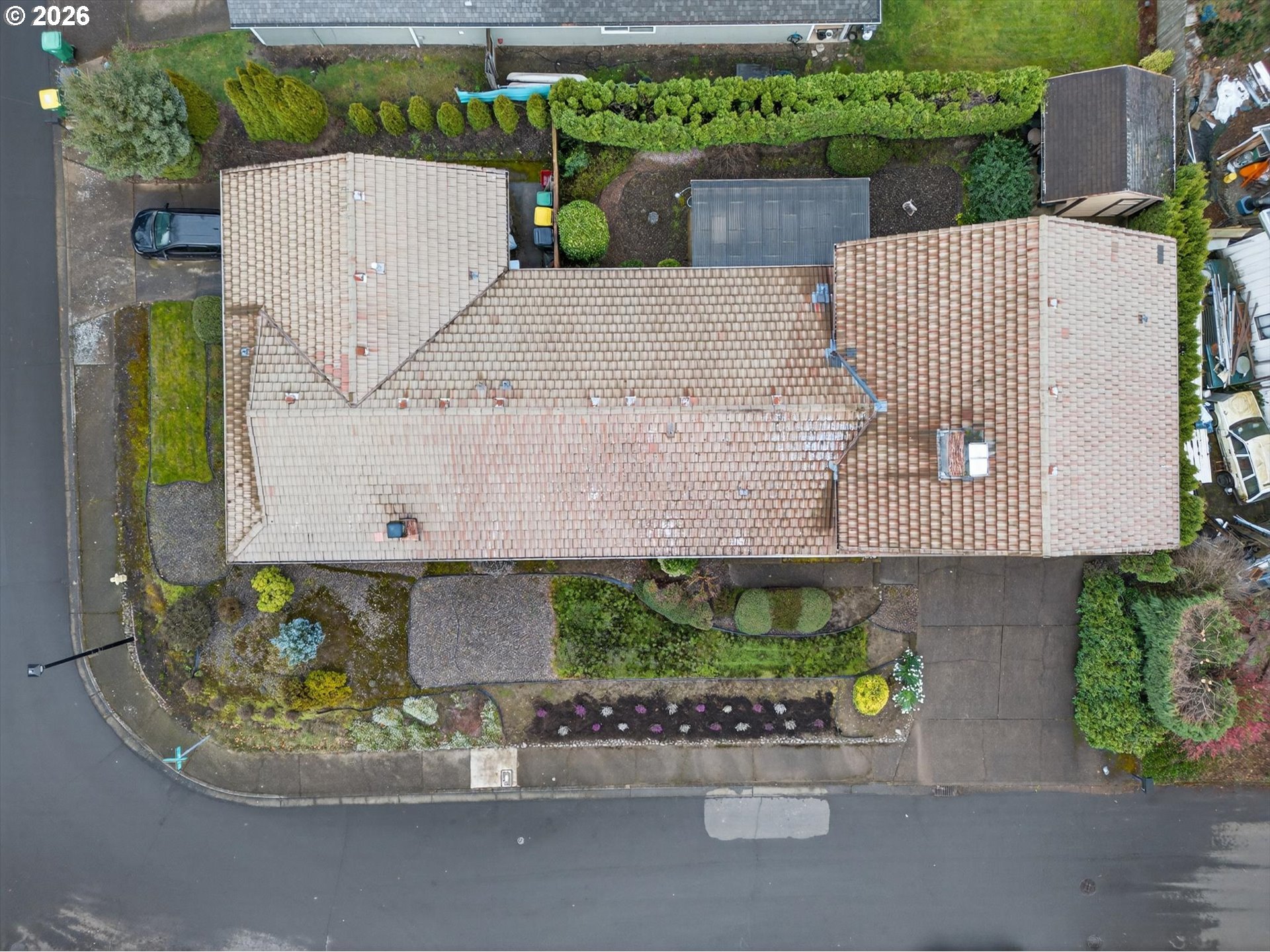 8050 Southwest 103rd Avenue Beaverton, OR 97008 - Photo 45 of 48 an aerial view of a house with a yard and a garden