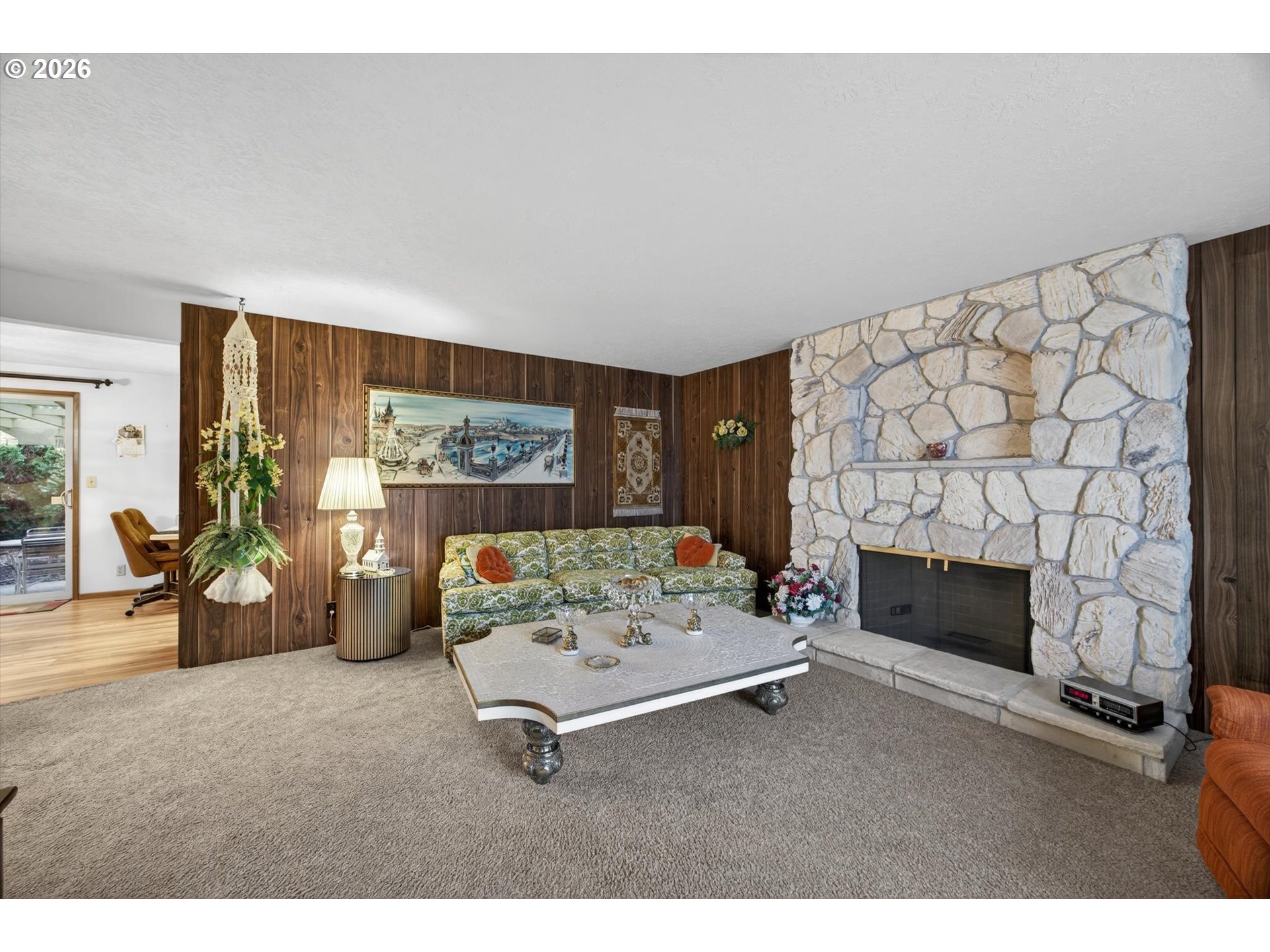 8050 Southwest 103rd Avenue Beaverton, OR 97008 - Photo 6 of 48 a living room with furniture and a fireplace