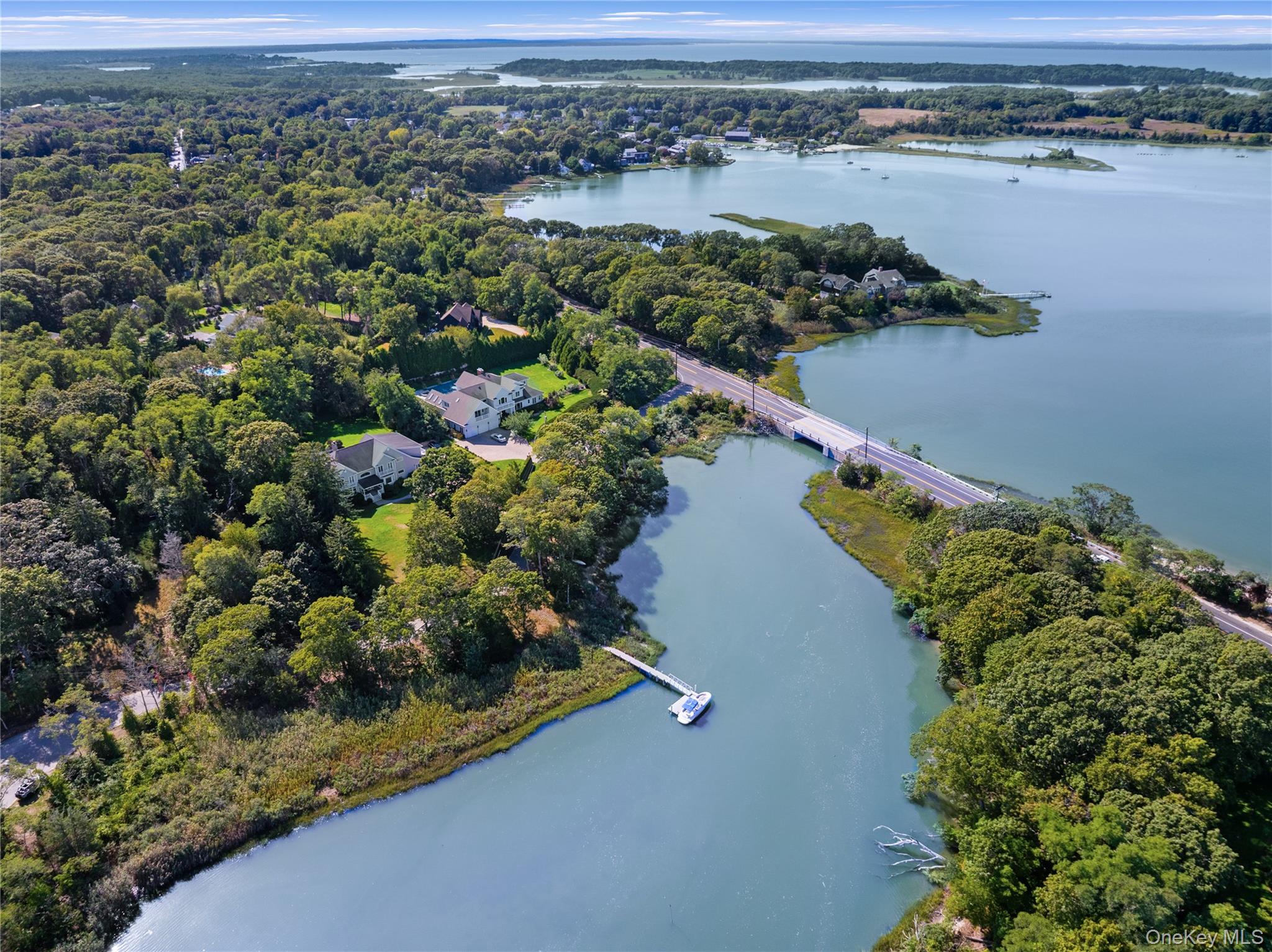 12 Fish Cove Road Southampton, NY 11968 - Photo 22 of 25 an aerial view of a residential houses with outdoor space and lake view