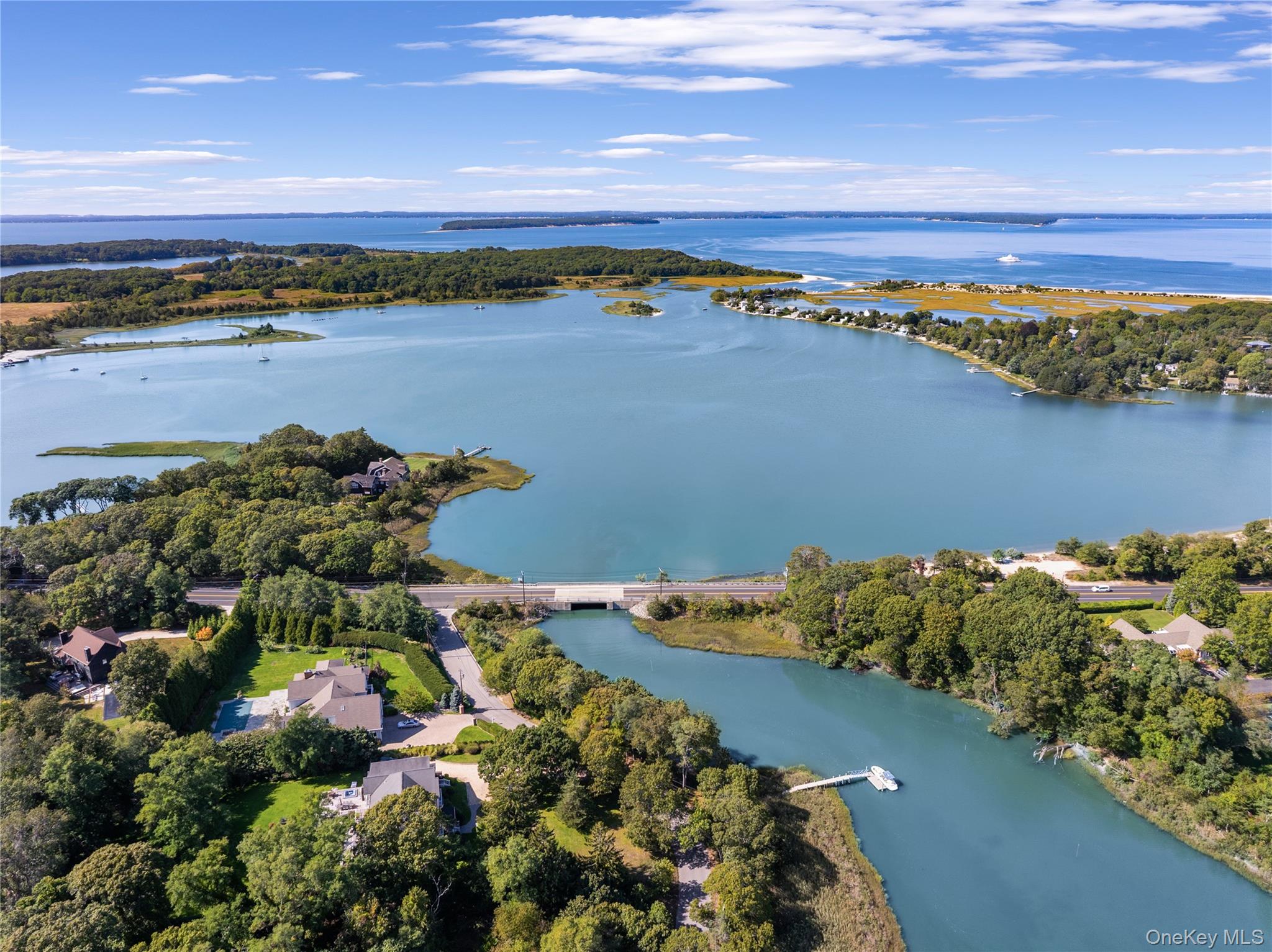 12 Fish Cove Road Southampton, NY 11968 - Photo 3 of 25 a view of a city and lake view