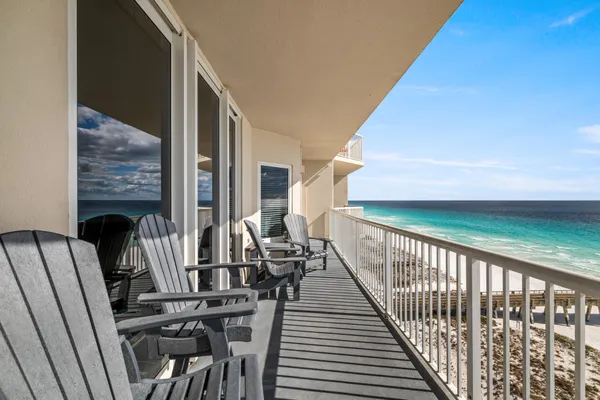 a view of balcony with furniture