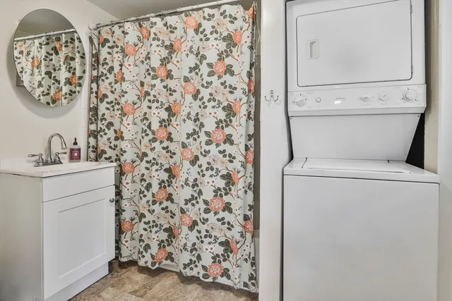 a bathroom with a toilet and a sink