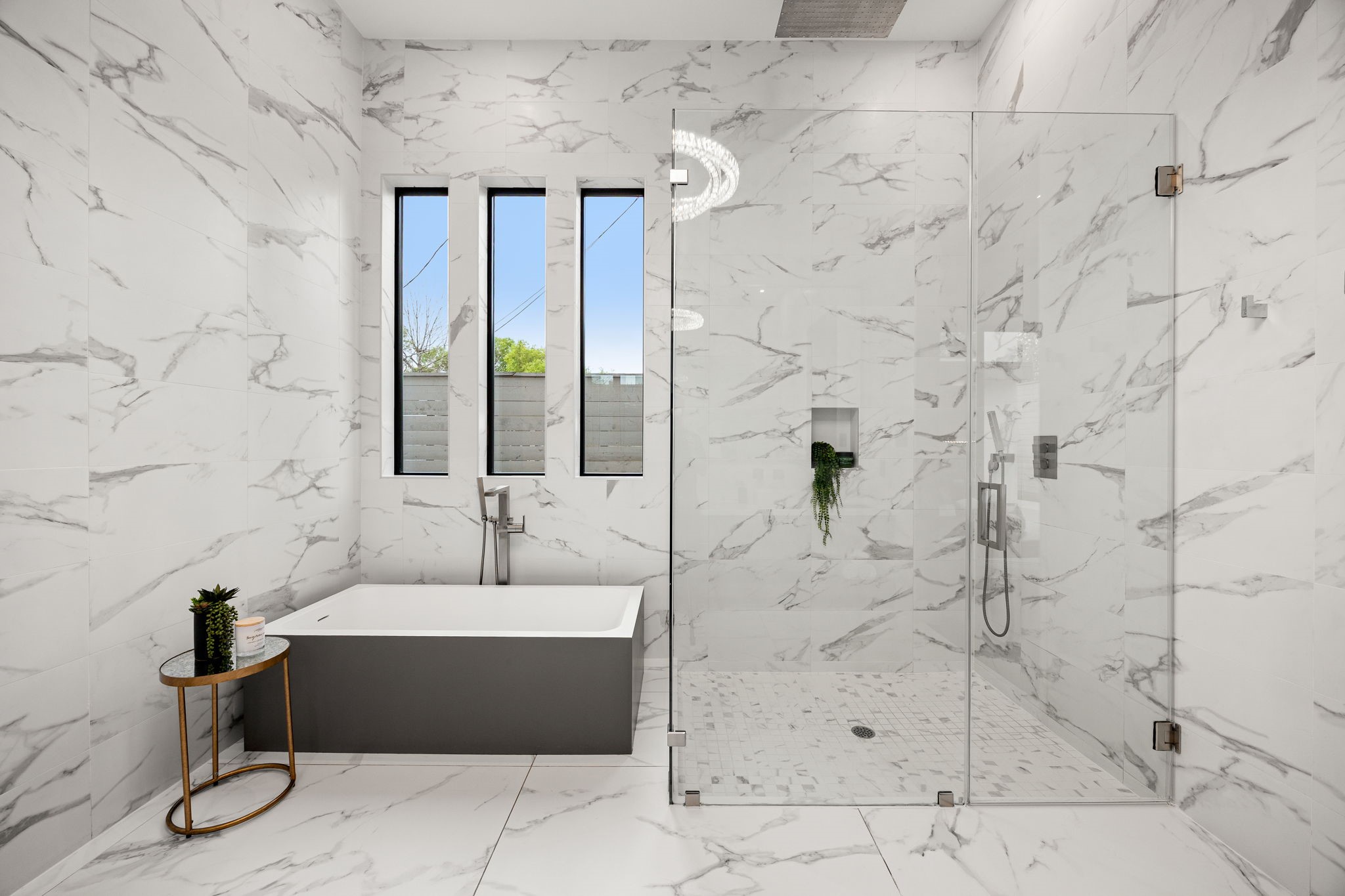 2302 Suffolk Drive Houston, TX 77027 - Photo 20 of 44 A spacious walk-in shower with glass doors