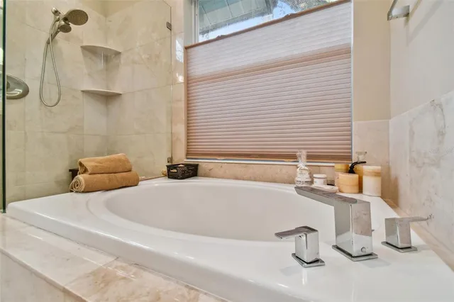 a bathroom with a sink double vanity and a mirror