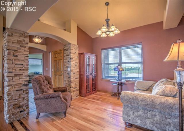 View of the sitting room, which could be used as a formal dining room. Notice the beautiful picture window 