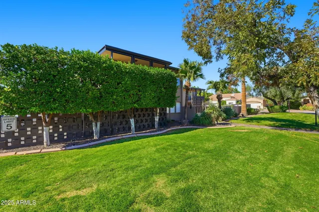 a view of a backyard with a garden