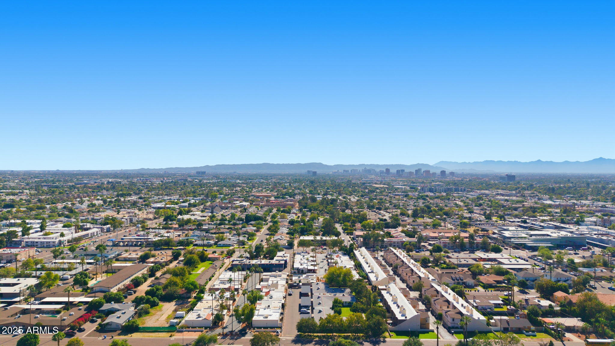 6544 North 12th Street, Unit 19 Phoenix, AZ 85014 - Photo 34 of 44 an aerial view of residential houses with city view