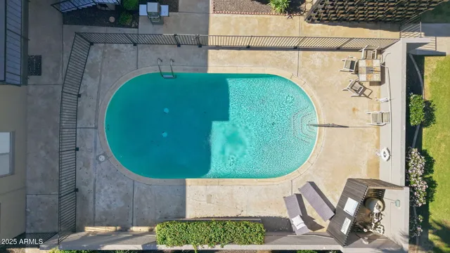 an aerial view of a swimming pool