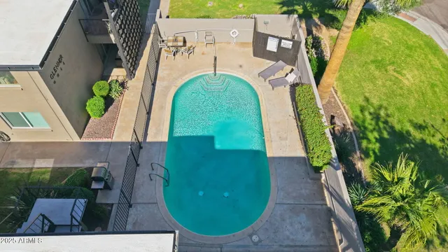 an aerial view of a house with a garden