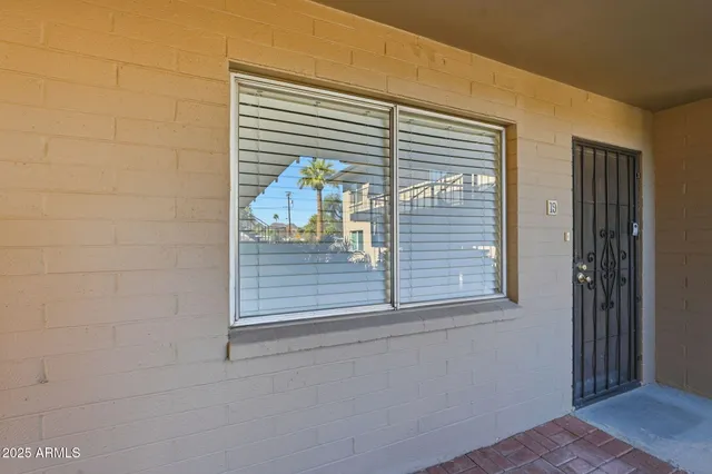 a view of entryway with bathroom