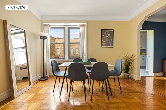 a workspace with furniture and wooden floor