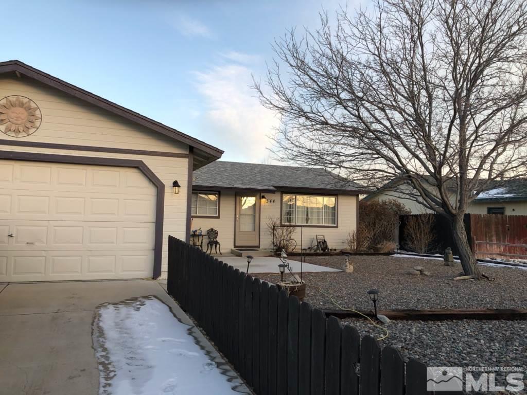 544 Yellow Jacket Road Dayton, NV 89403 - Photo 1 of 8 a front view of a house with a yard