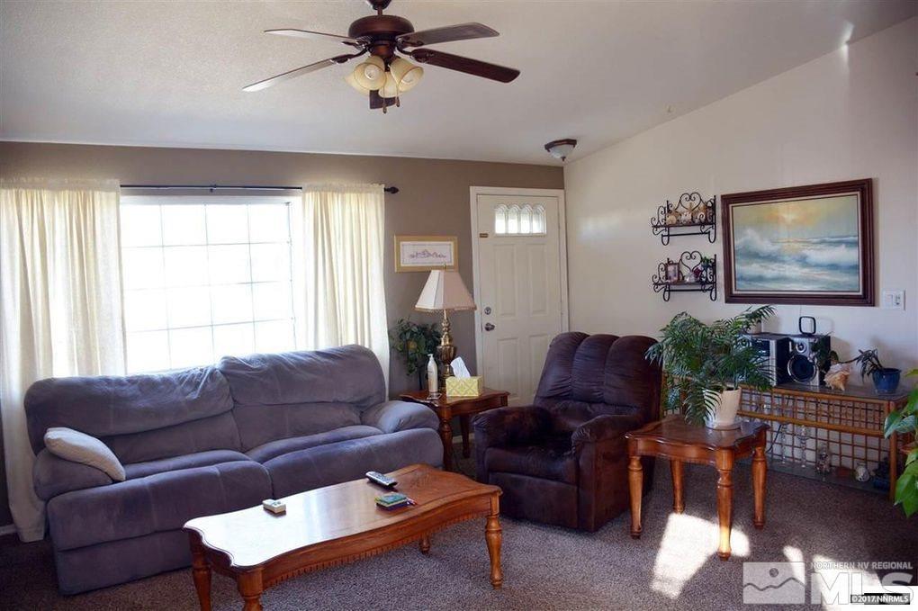 544 Yellow Jacket Road Dayton, NV 89403 - Photo 4 of 8 a living room with furniture and a window