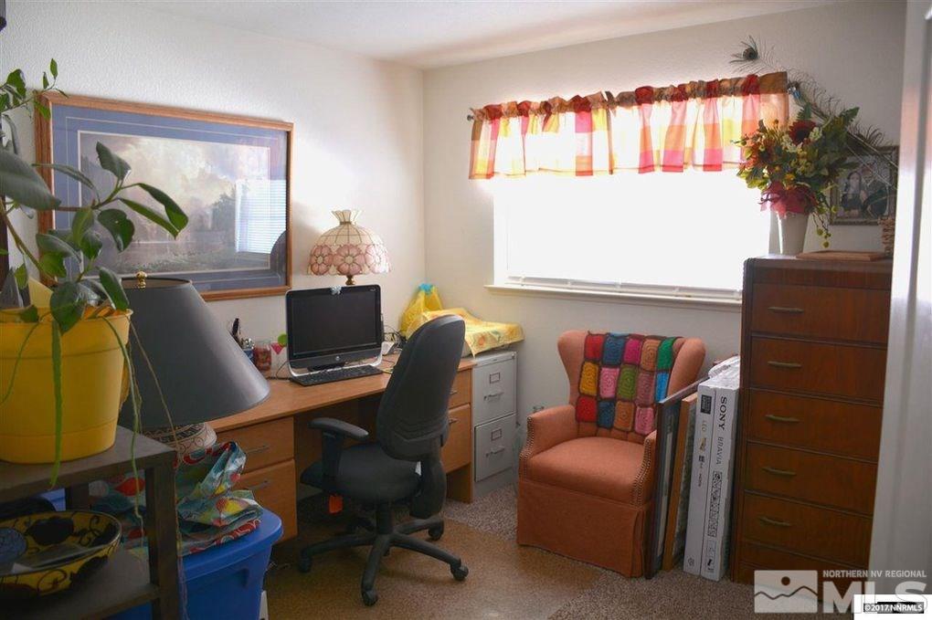 544 Yellow Jacket Road Dayton, NV 89403 - Photo 6 of 8 a work room with furniture and a window