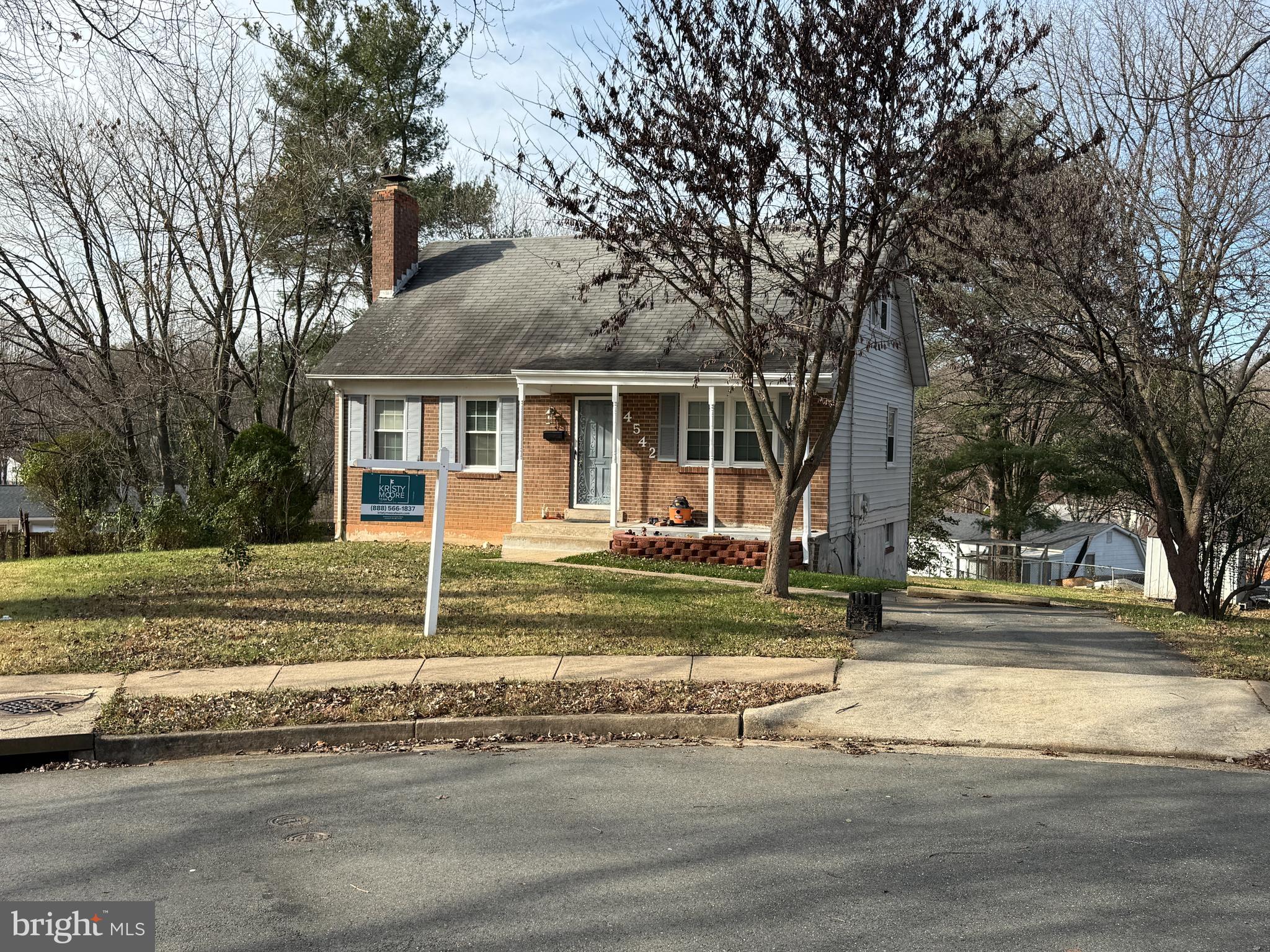 4542 Kingston Road Woodbridge, VA 22193 - Photo 1 of 15 a view of a house with a big yard plants and large trees