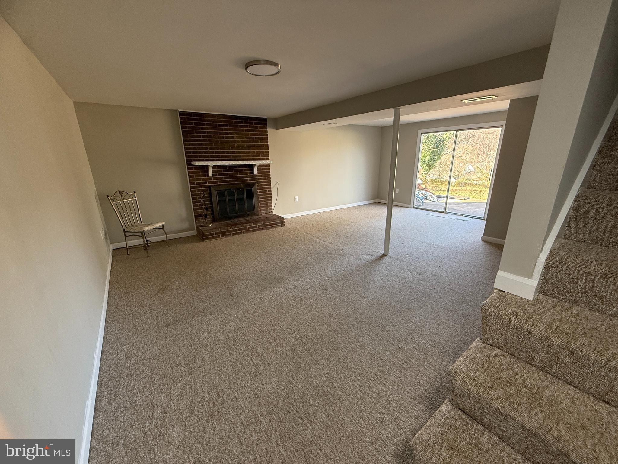 4542 Kingston Road Woodbridge, VA 22193 - Photo 12 of 15 a view of empty room with a fireplace