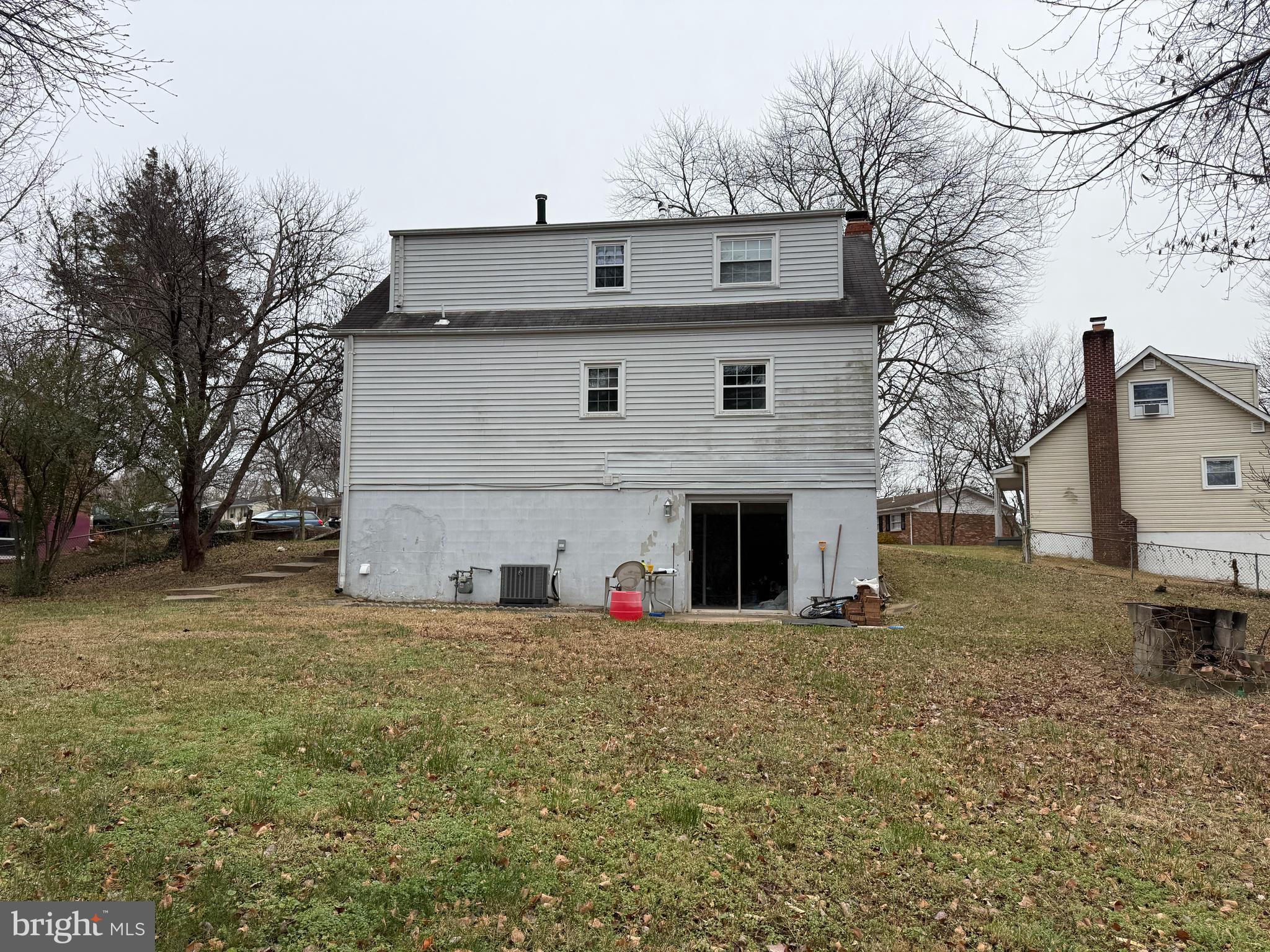 4542 Kingston Road Woodbridge, VA 22193 - Photo 14 of 15 a view of a house with a yard