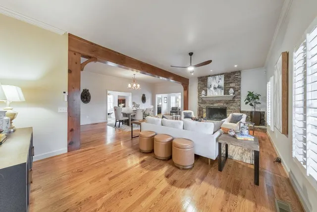 a living room with furniture and a rug