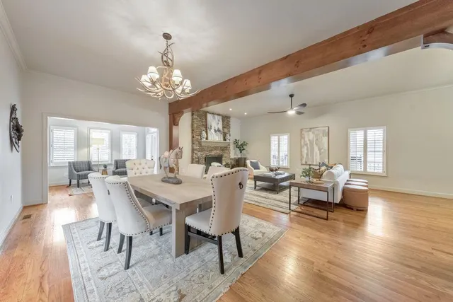 a living room with furniture and a rug