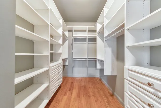 a view of a house with swimming pool and a yard