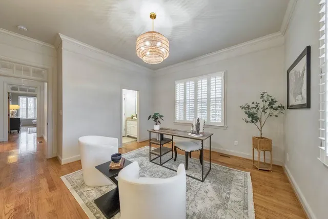 a view of a house with swimming pool and porch
