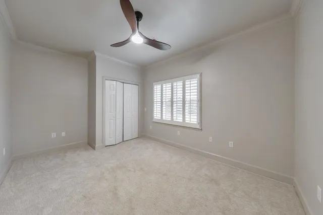 a view of yard with swimming pool and sitting space