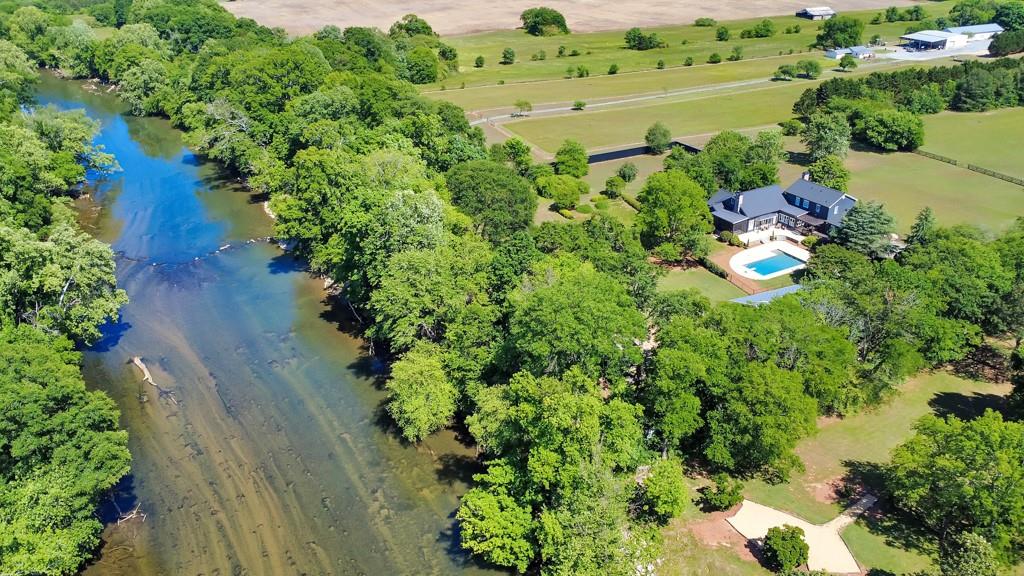 528 Old Alabama Road Southeast Cartersville, GA 30120 - Photo 96 of 101 an aerial view of a house with a yard and lake view