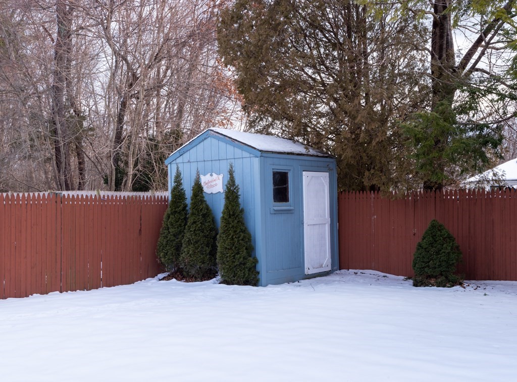 7 Robinson Road Beverly, MA 01915 - Photo 12 of 27 a front view of a house with a yard