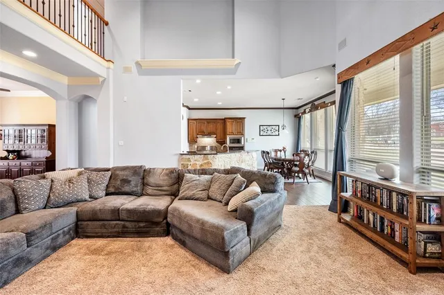 a kitchen with stainless steel appliances granite countertop a stove and a refrigerator