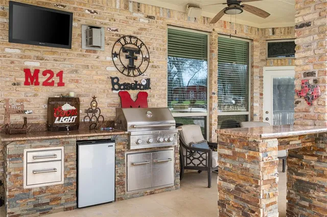 a view of a house with swimming pool and sitting area