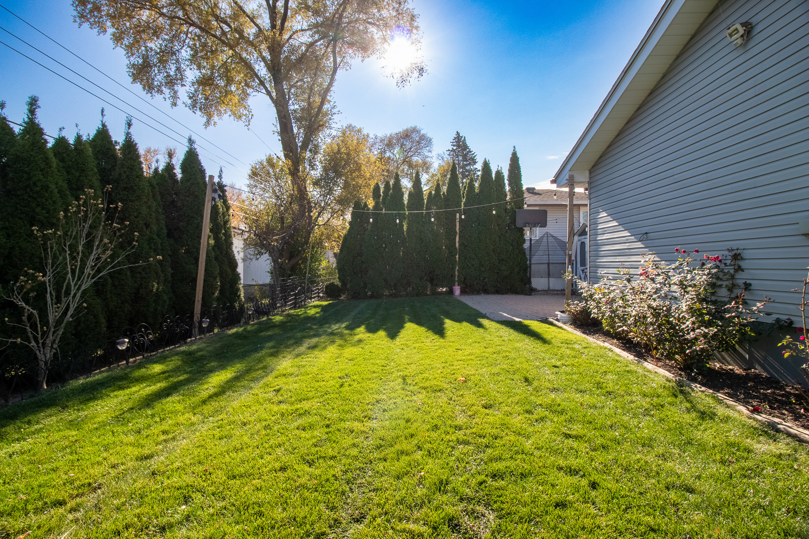 379 Stone Place Wheeling, IL 60090 - Photo 27 of 27 a view of yellow house with a yard