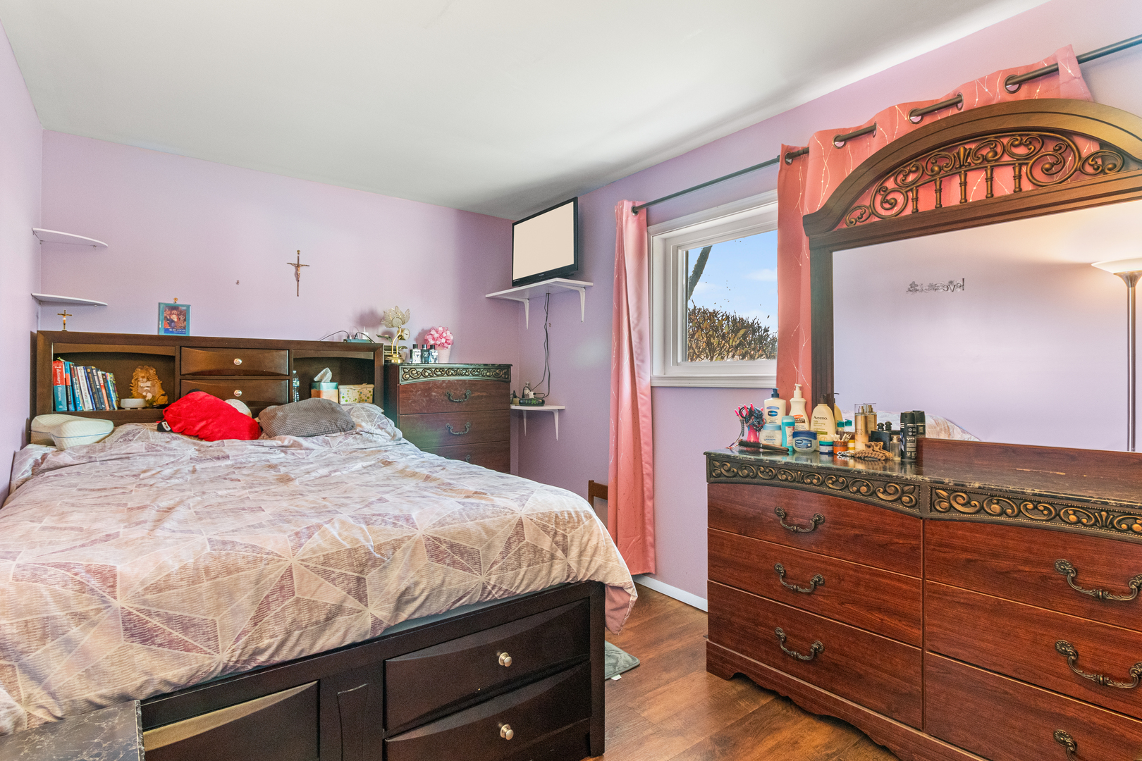 379 Stone Place Wheeling, IL 60090 - Photo 4 of 27 a bedroom with a bed and a dresser