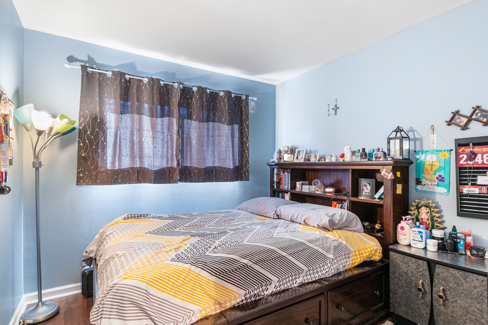 379 Stone Place Wheeling, IL 60090 - Photo 6 of 27 a bedroom with a bed and a baby crib