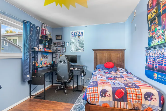 a view of a workspace with furniture and toys