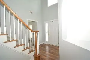 a view of an entryway with staircase