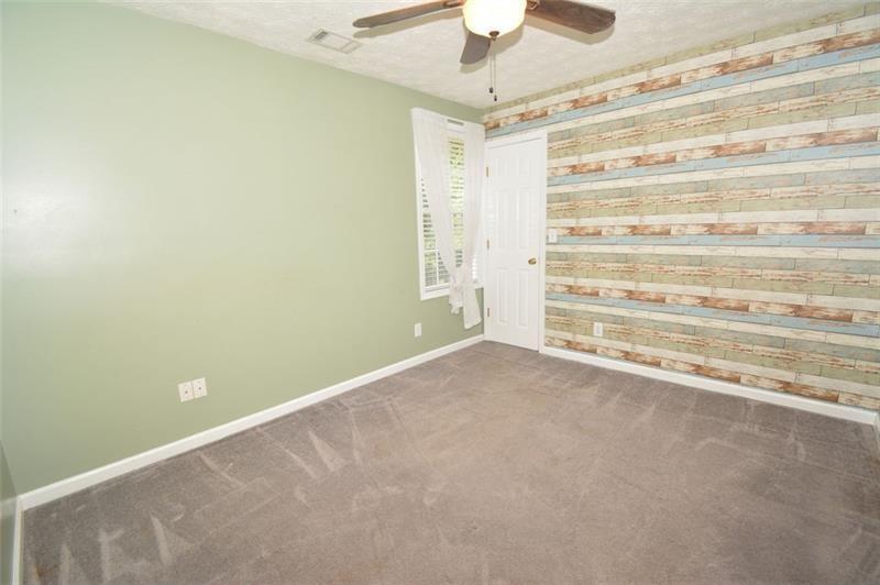 1740 Big Haynes Court Southwest Grayson, GA 30017 - Photo 21 of 29 a view of room and empty room