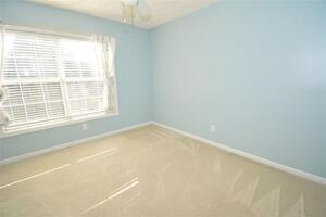 1740 Big Haynes Court Southwest Grayson, GA 30017 - Photo 24 of 29 an empty room with a window