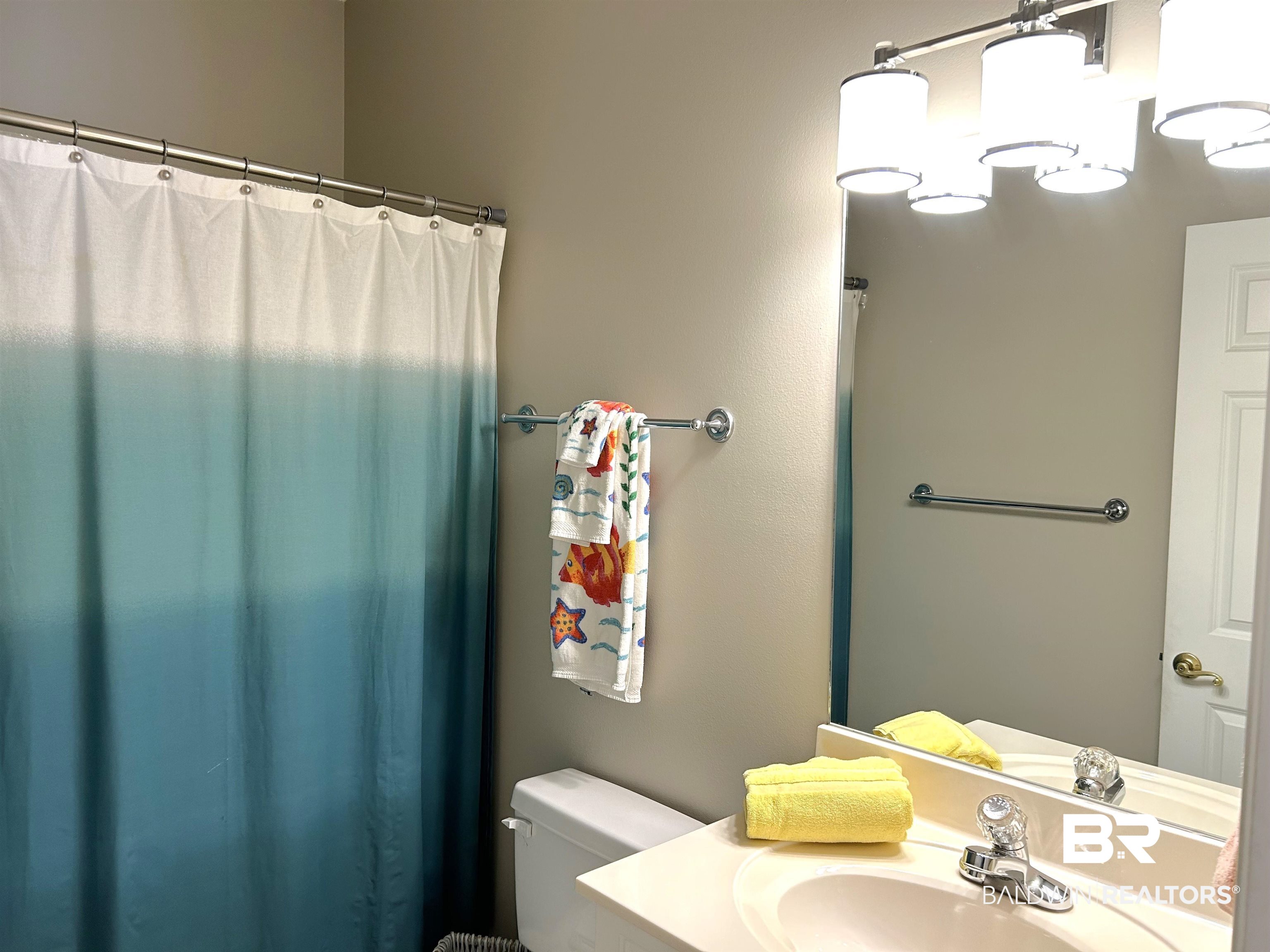 430 West Fort Morgan Road, Unit 404 Gulf Shores, AL 36542 - Photo 23 of 31 Bathroom featuring toilet and vanity