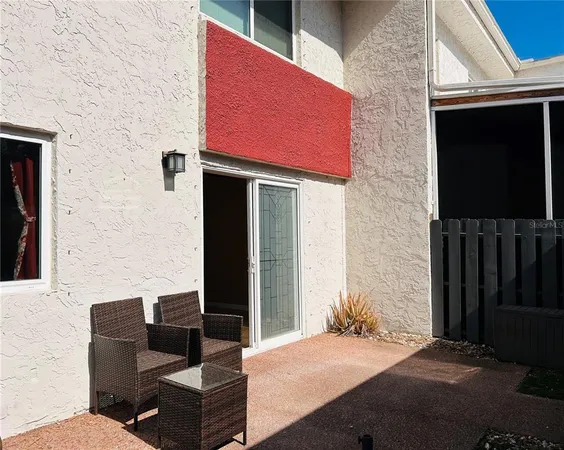 a building outdoor space with patio furniture