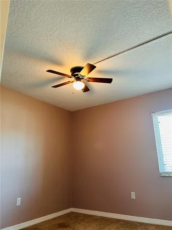 a view of a chandelier fan