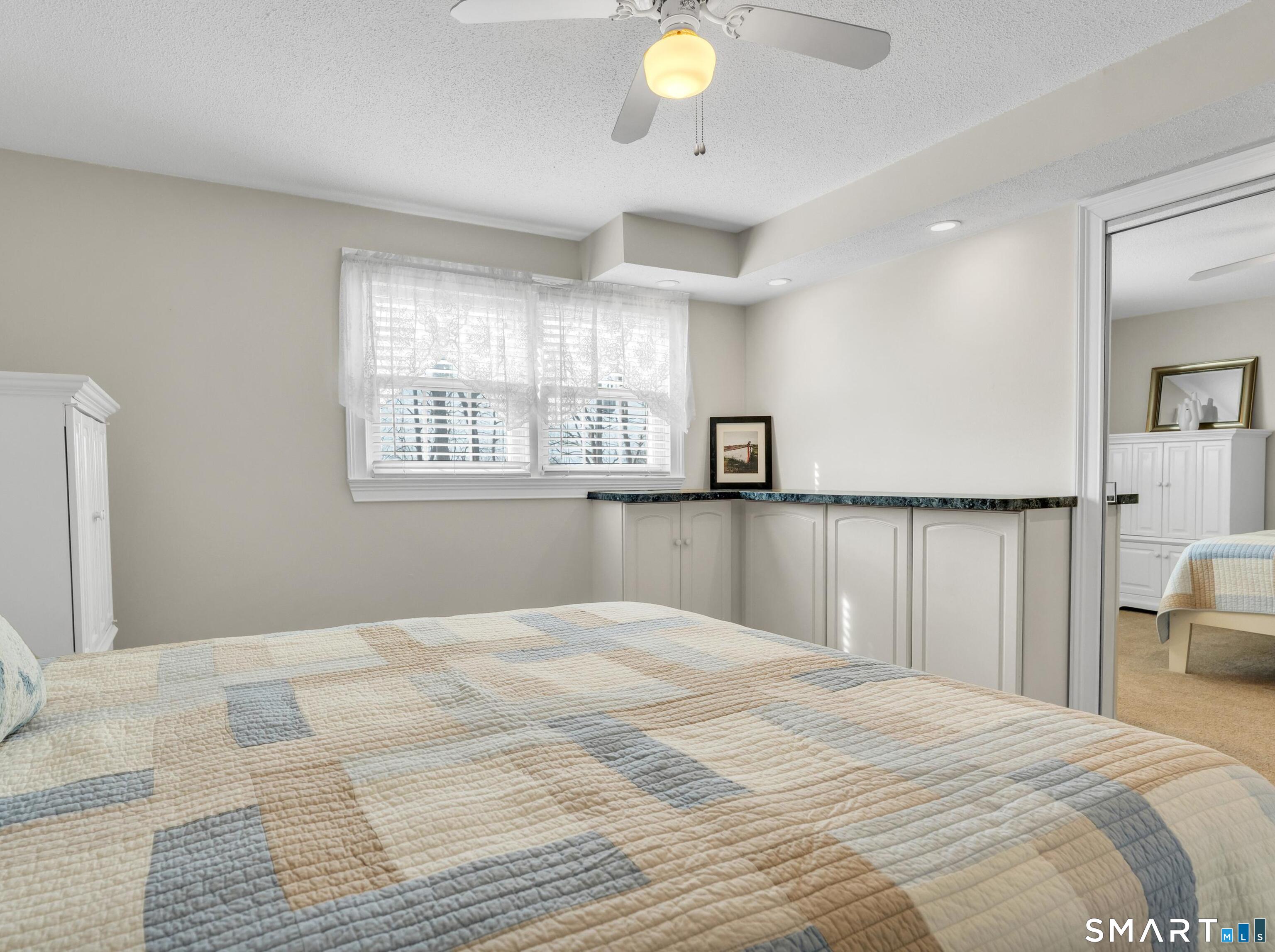 280 East Main Street, Unit B5 Clinton, CT 06413 - Photo 12 of 19 This bedroom adds extra living space with storage and closet space.