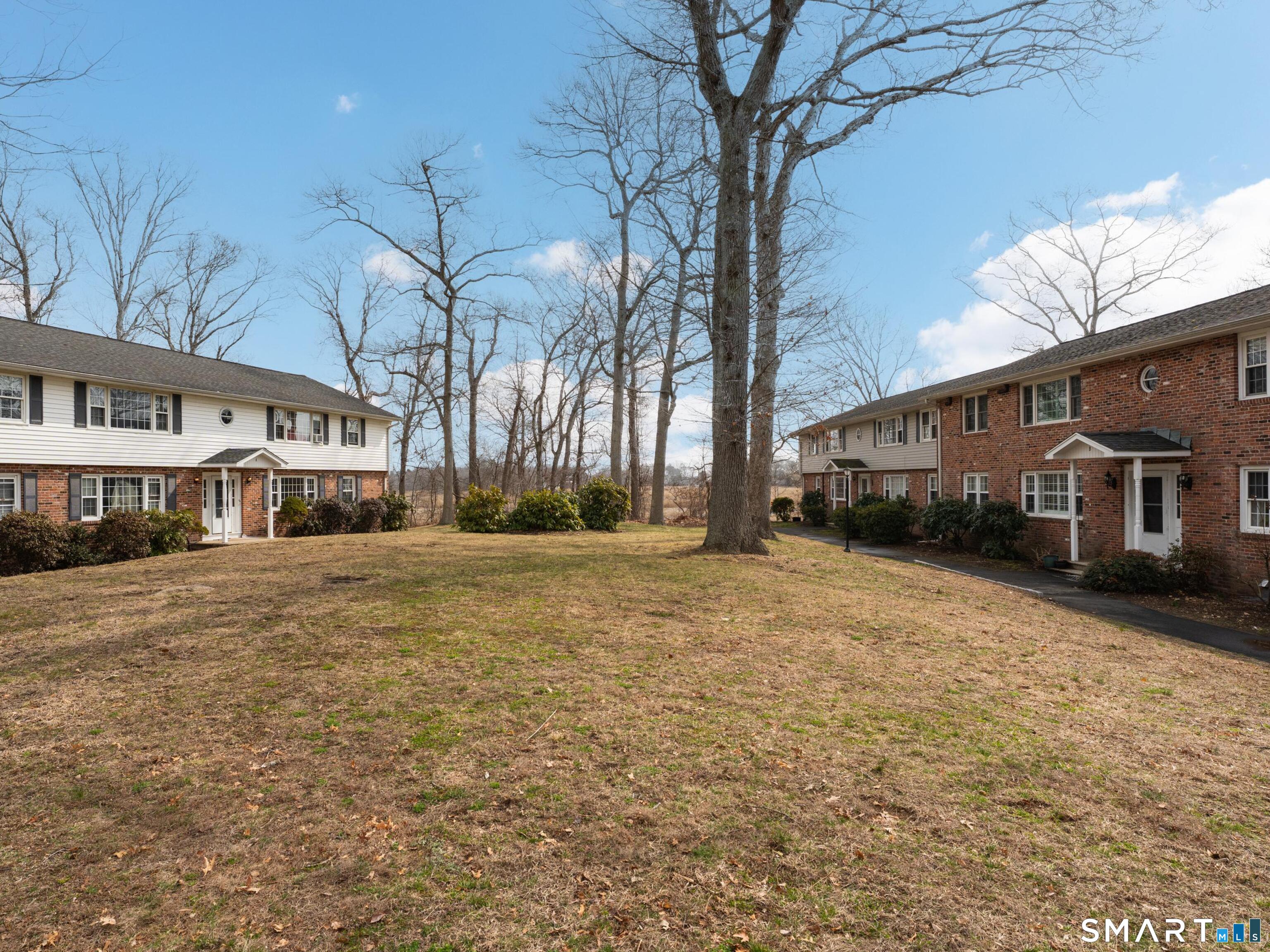 280 East Main Street, Unit B5 Clinton, CT 06413 - Photo 14 of 19 Complex courtyard leading to front entry of units.