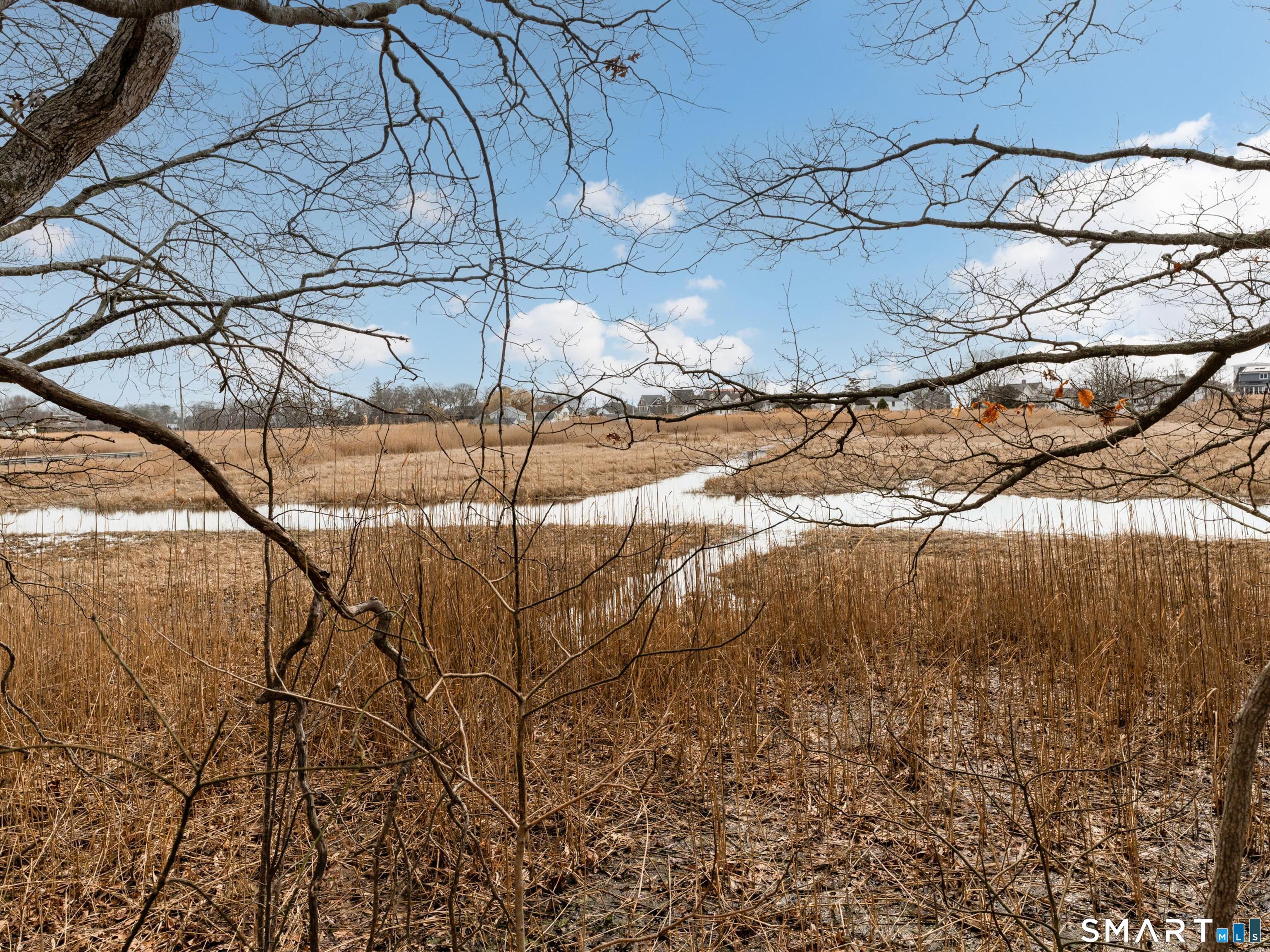 280 East Main Street, Unit B5 Clinton, CT 06413 - Photo 2 of 19 Enjoy the view of the causeway from the kitchen window and backyard.