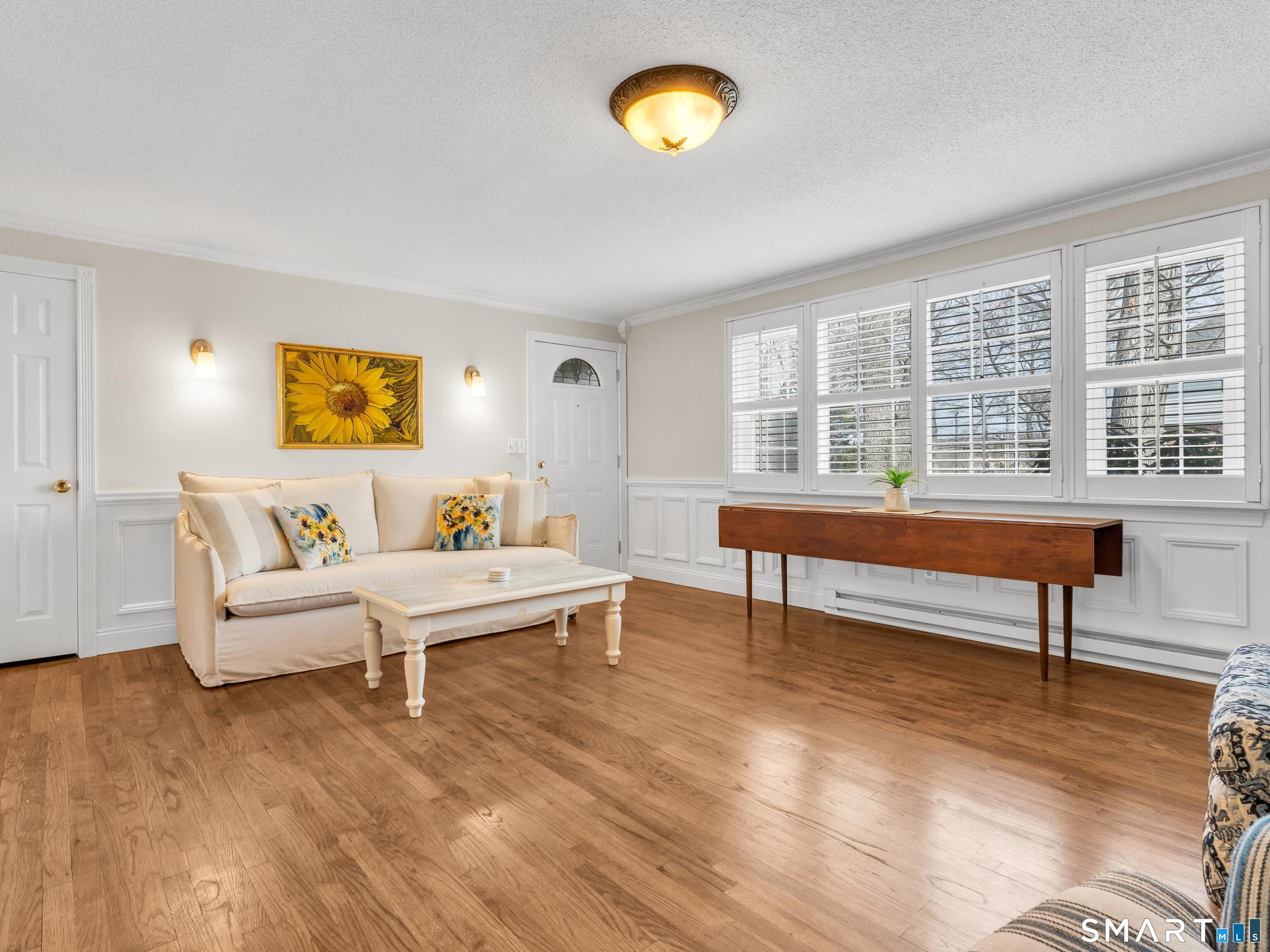280 East Main Street, Unit B5 Clinton, CT 06413 - Photo 7 of 19 The living room has a closet for added storage and a front door to the main entry of the 4 unit building that leads to the front courtyard.