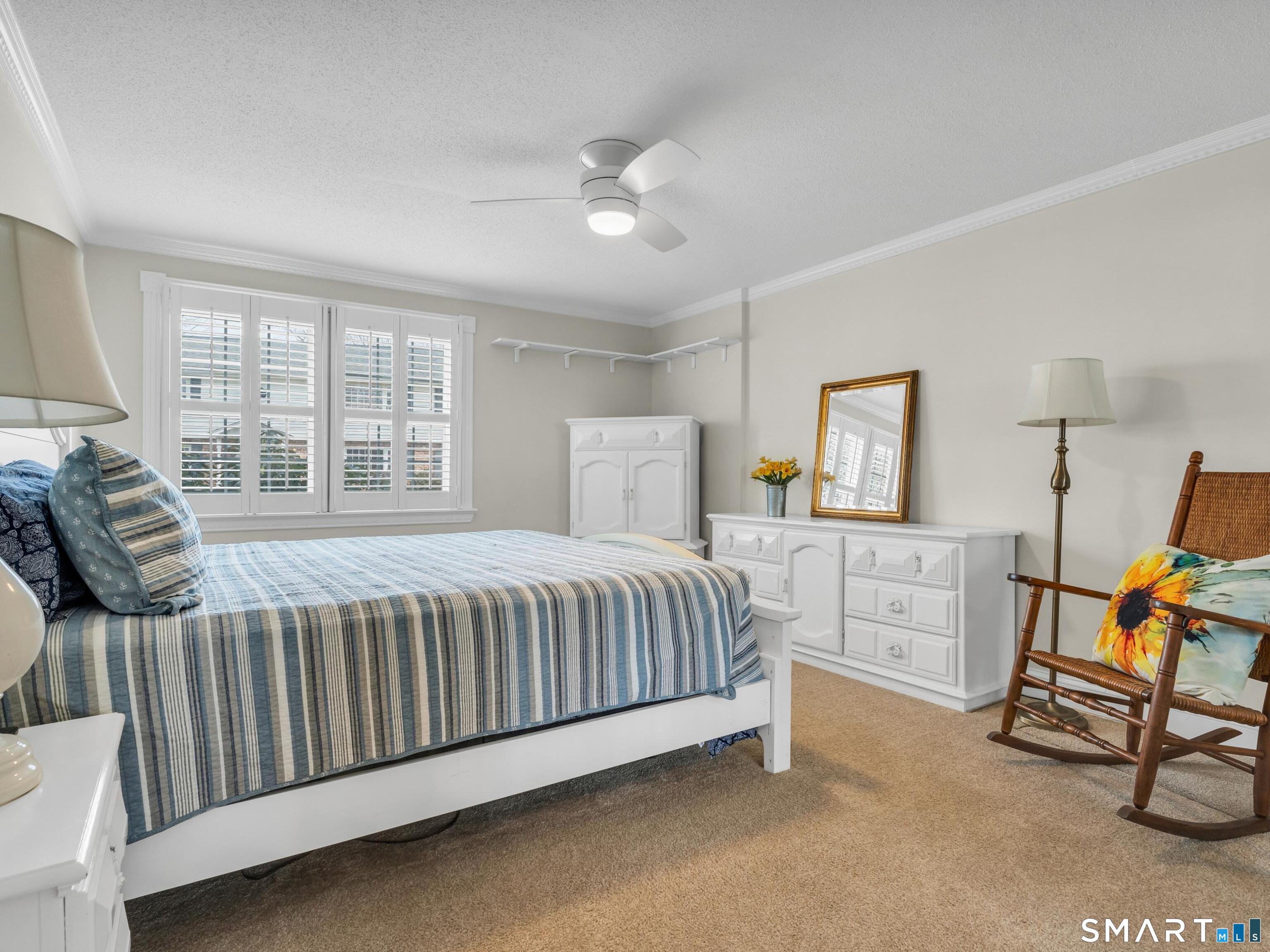 280 East Main Street, Unit B5 Clinton, CT 06413 - Photo 8 of 19 Spacious and bright primary bedroom.