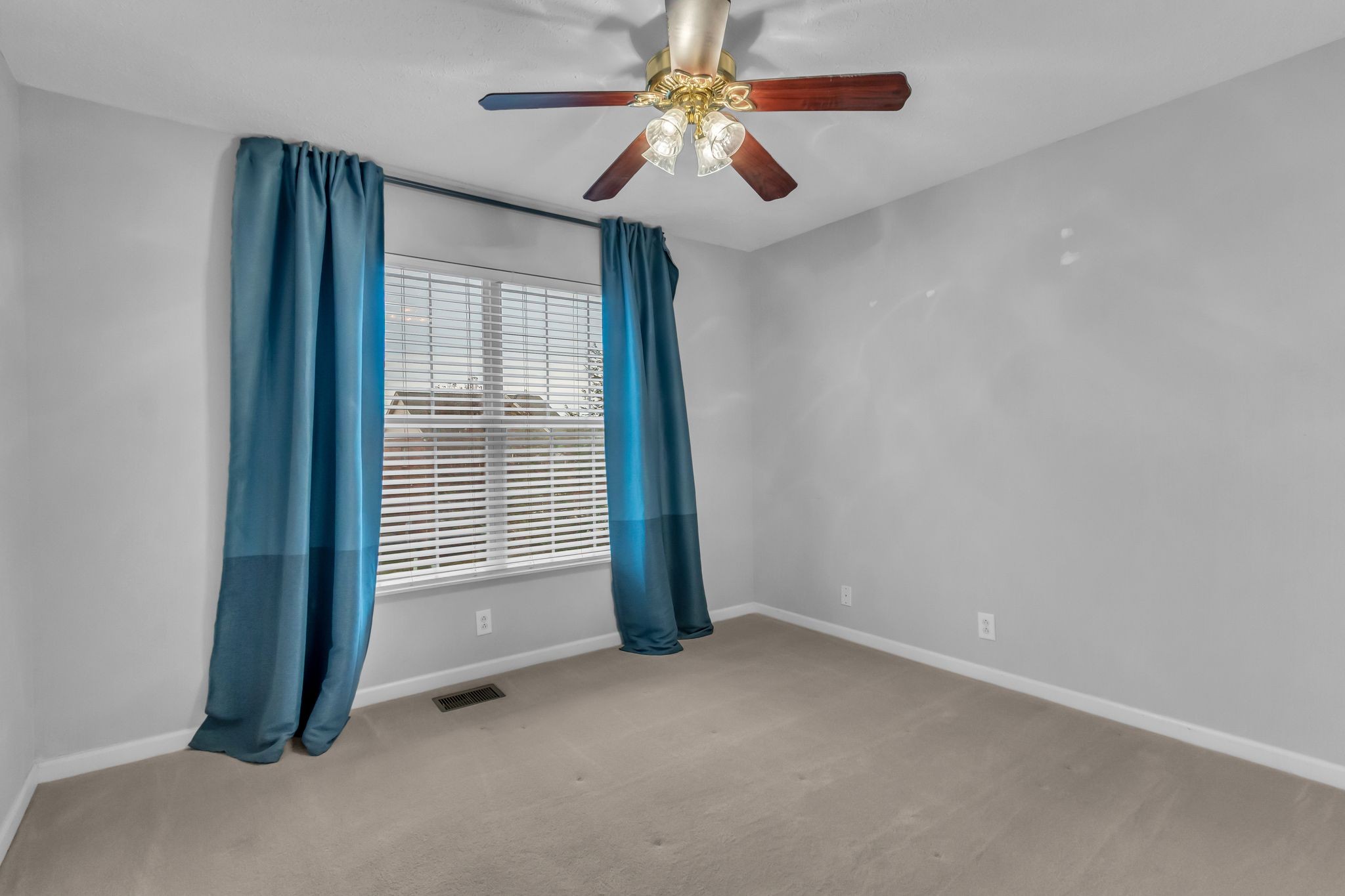 505 Hollyhock Way Franklin, TN 37064 - Photo 23 of 28 a view of a livingroom with a chandelier fan and windows