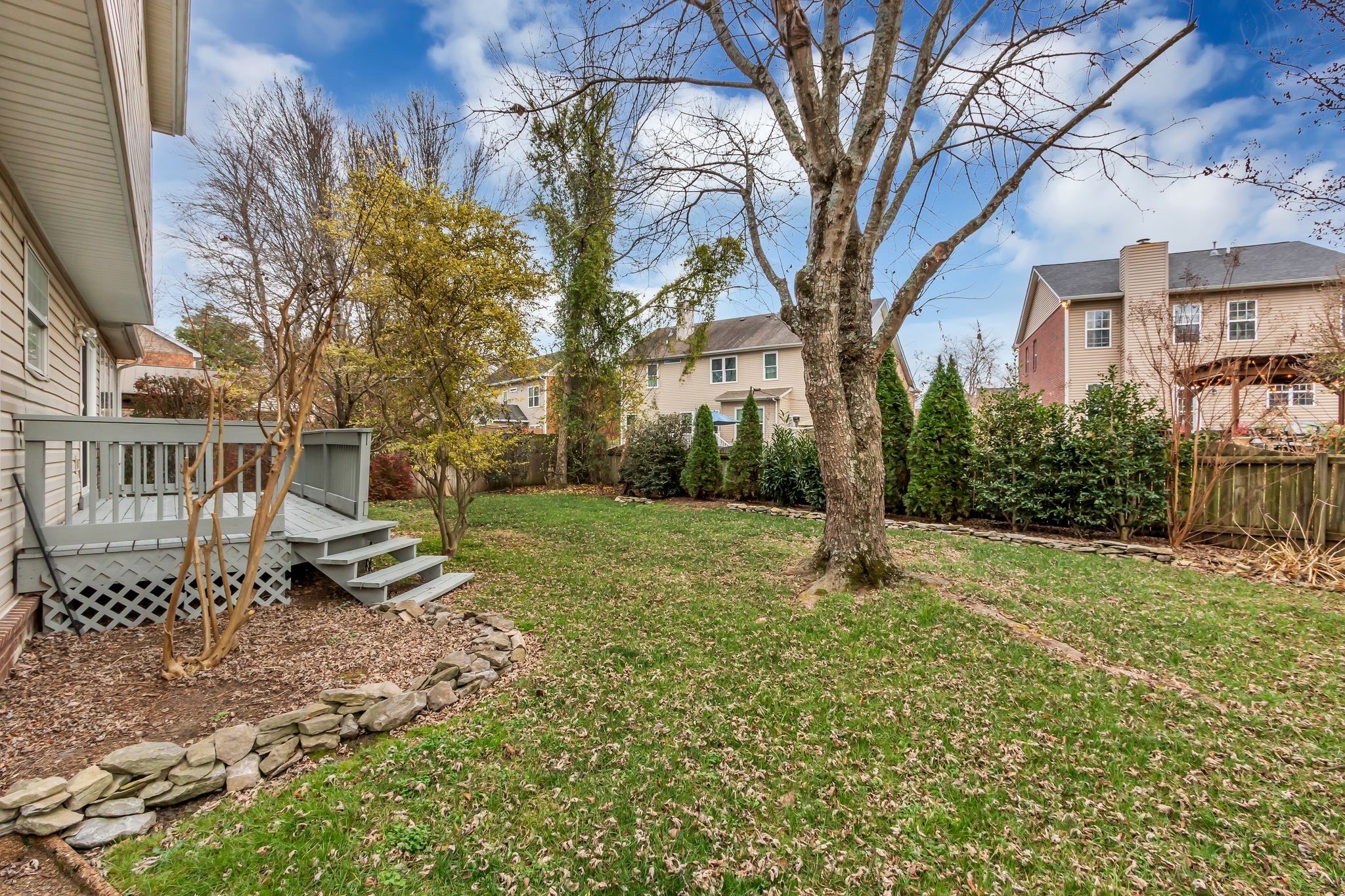 505 Hollyhock Way Franklin, TN 37064 - Photo 28 of 28 a garden with trees in front of it